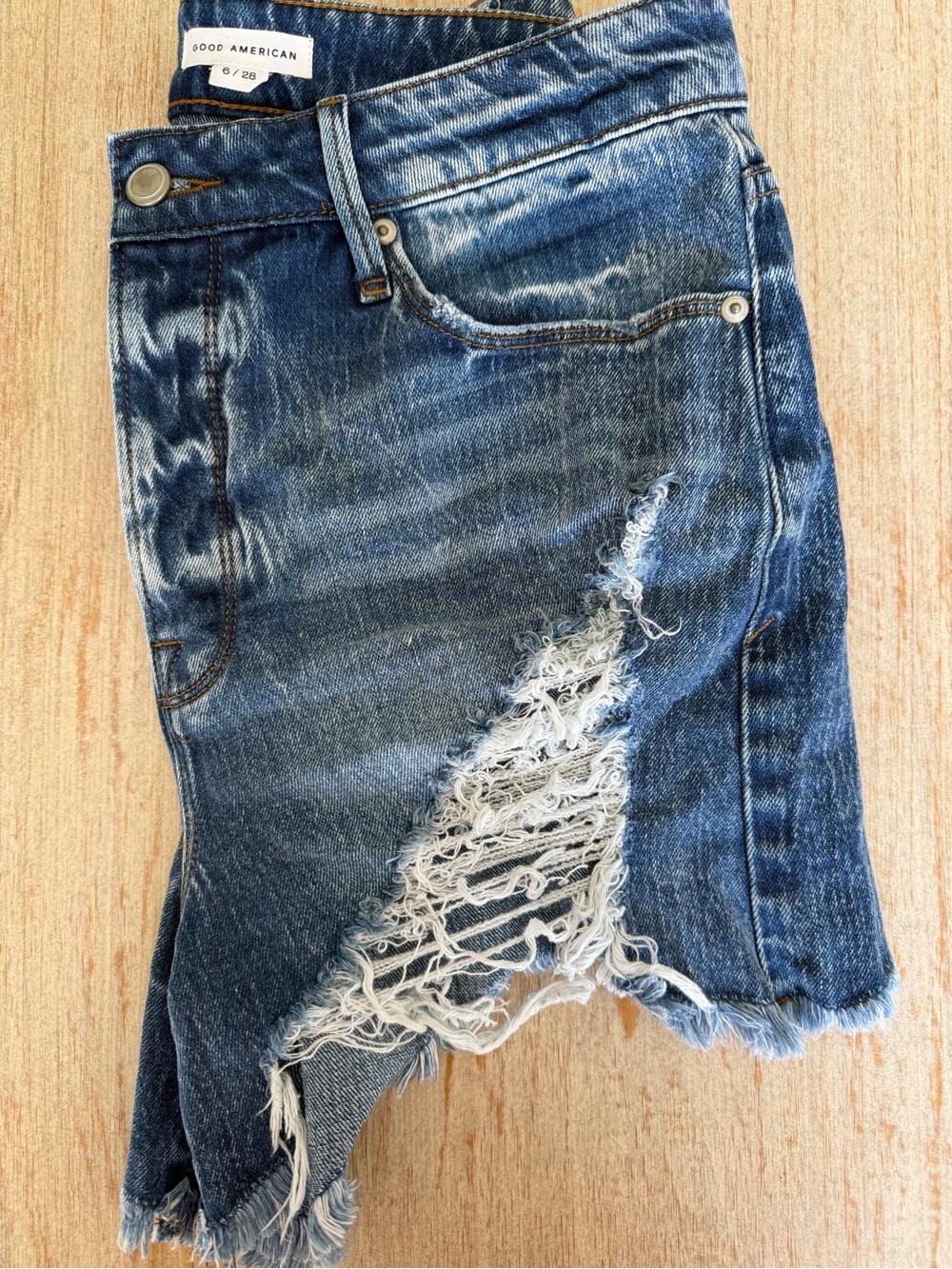 Good American Faded Blue Distressed Denim Shorts